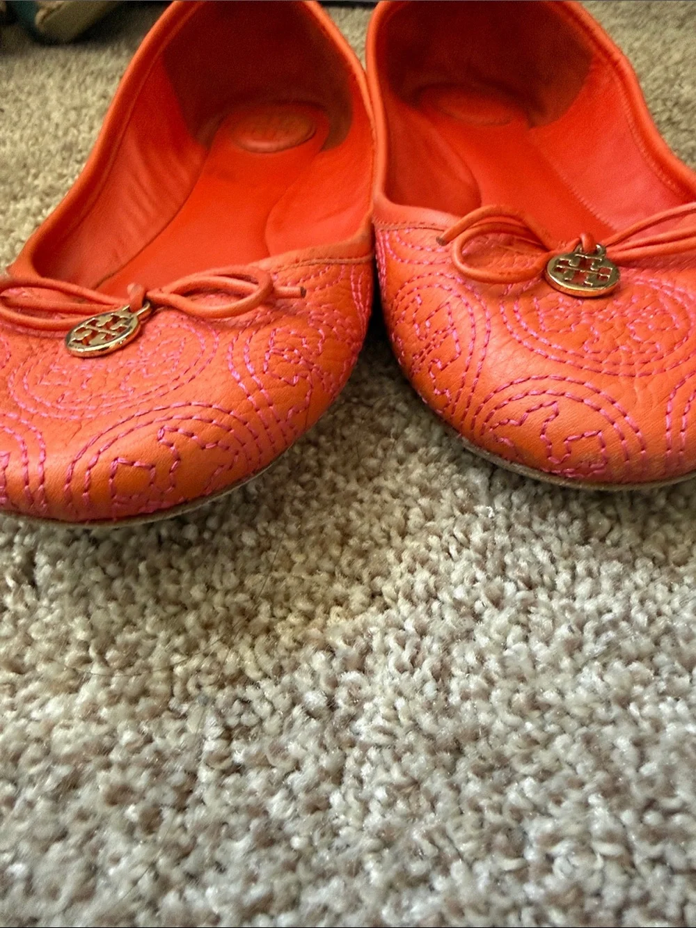 Tory Burch Coral-Orange Quilted Leather Ballet Flats with Logo Charm